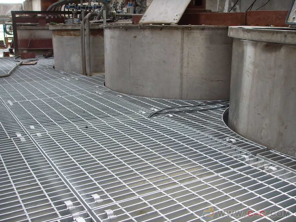 Swage-locked grating